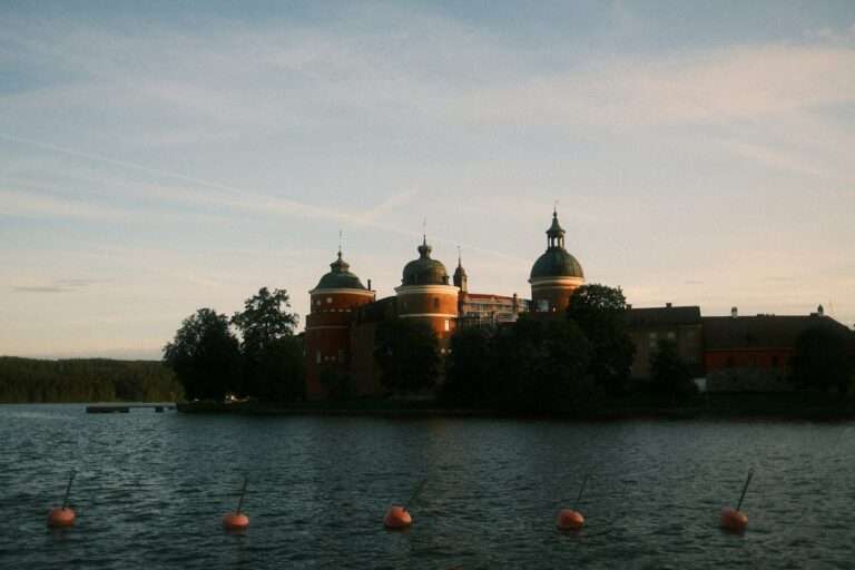 Gripsholm Castle's round brick towers on the shore of Lake Mälaren